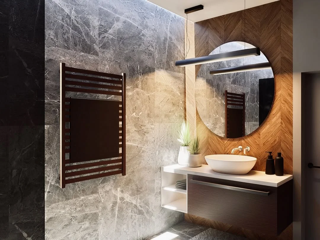 Baño contemporáneo con mármol, madera cálida y espejo redondo